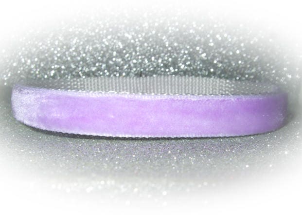 purple collar on a white background with glitter background effects
