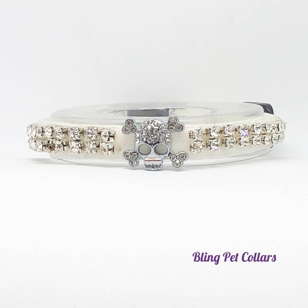 cat collar with decorative stones on a white background, branded 'Bling Pet Collars'.
