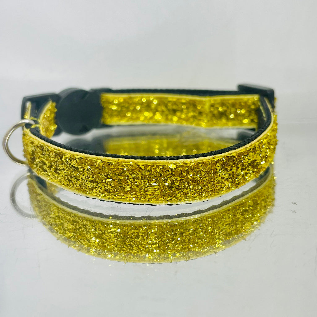 Gold glittery collar on a white background